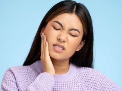 Woman with Gum Disease Gingivitis pain
