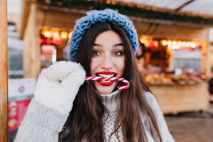 Woman eating sweet holiday treat